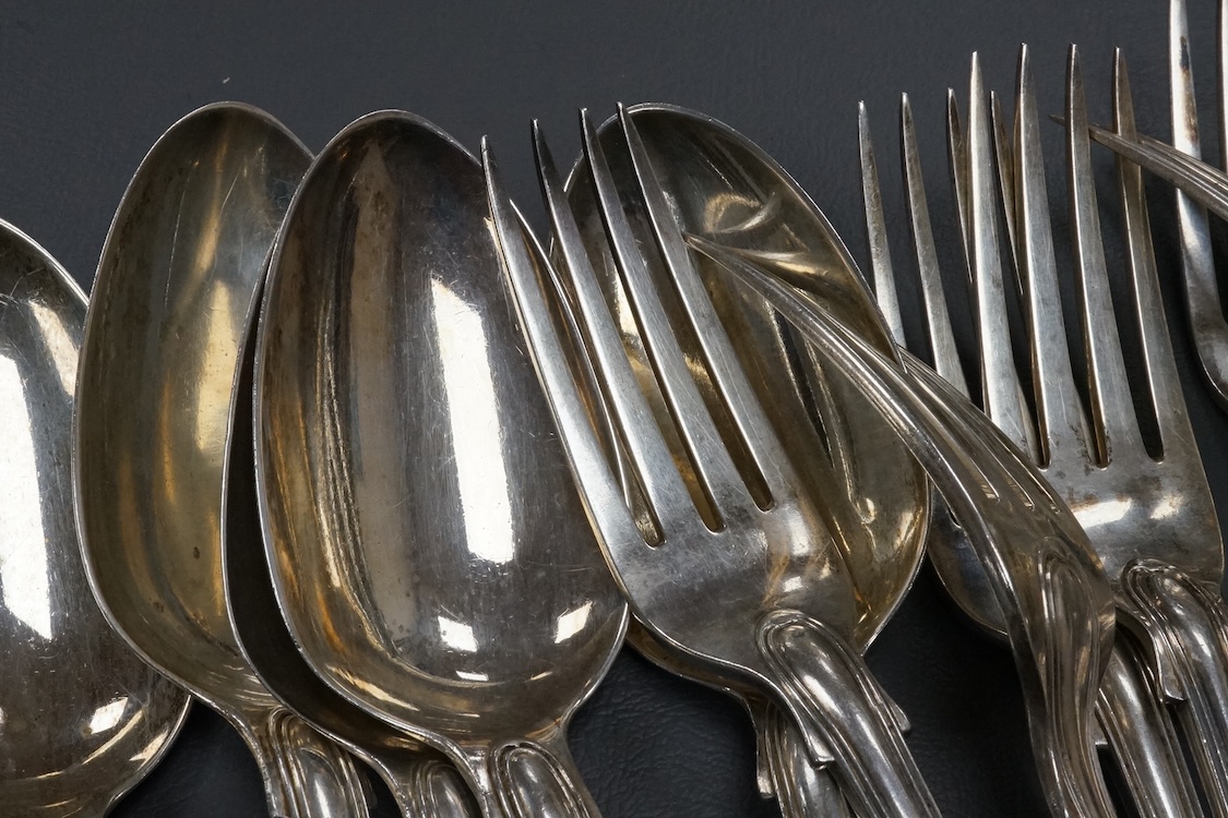 A set of eight William IV silver fiddle and thread pattern table forks, by Mary Chawner, London, 1834, 20.7cm and six matching table spoons, London, 1835, 40.5oz.